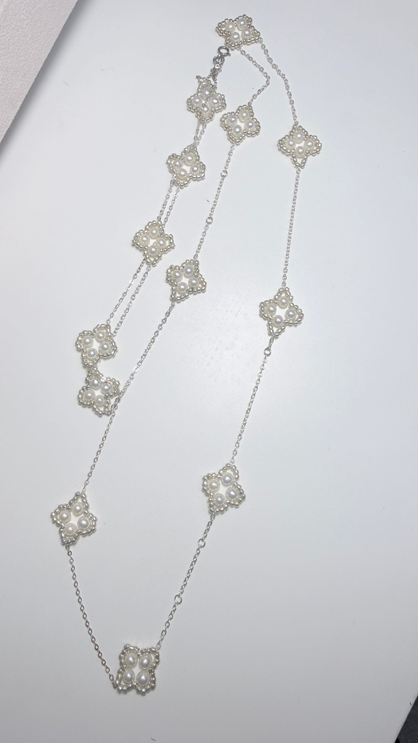 Four-leaf clover sweater chain