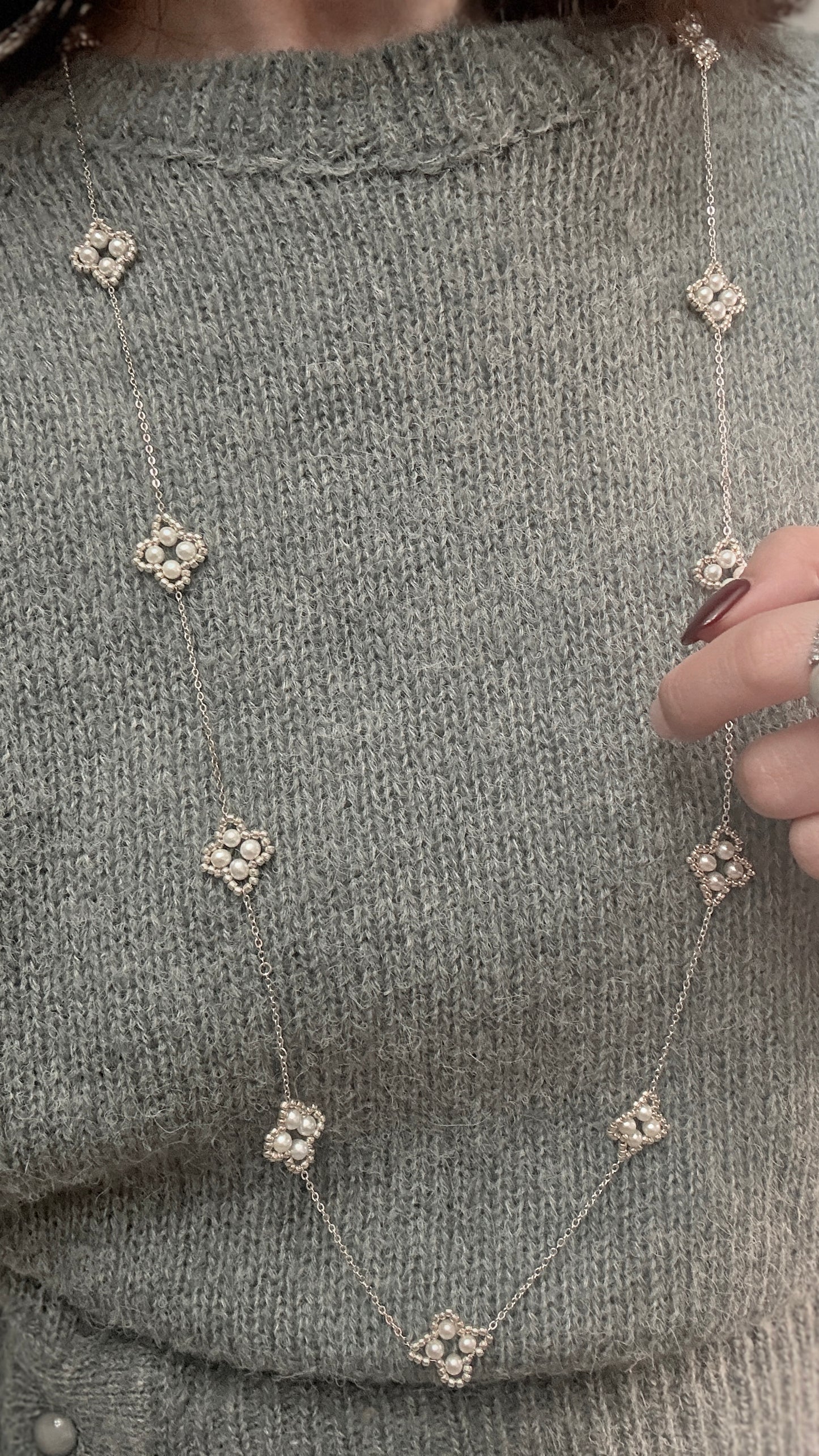 Four-leaf clover sweater chain