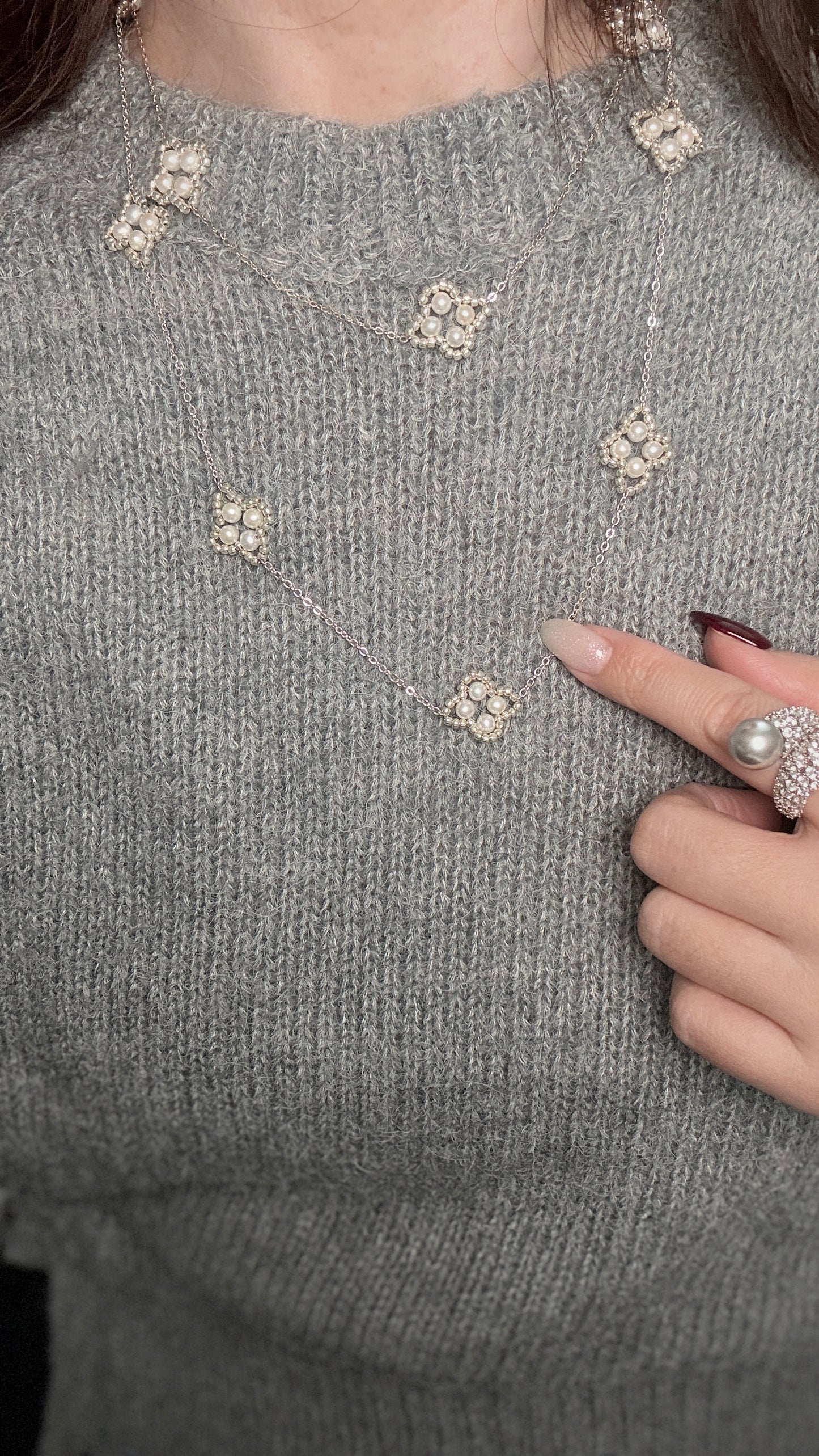 Four-leaf clover sweater chain